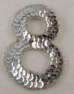 Numero 8 con paillettes argento