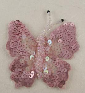 Farfalla con paillettes e perline rosa